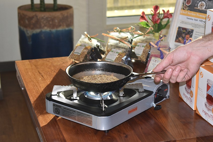 Chef Chris Johnson toasts fennel.