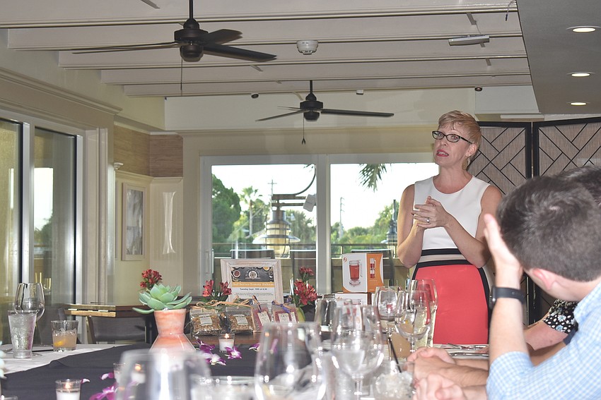 Lindsey Gaviria teaches the crowd about what they're eating.