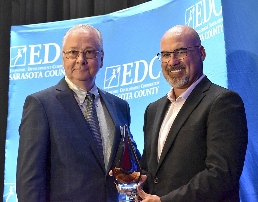 Peter McAllister and Ringling College Innovation by Creative Design awardee Christopher Stidd.