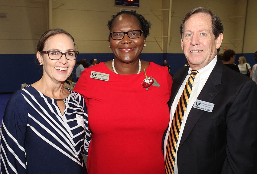 Rebecca Abrahamson, honoree Rachel Shelley and Michael Shelton