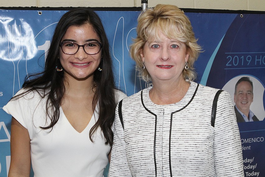 Co-emcees Leonela Tase Sueiro and Lisa Carlton