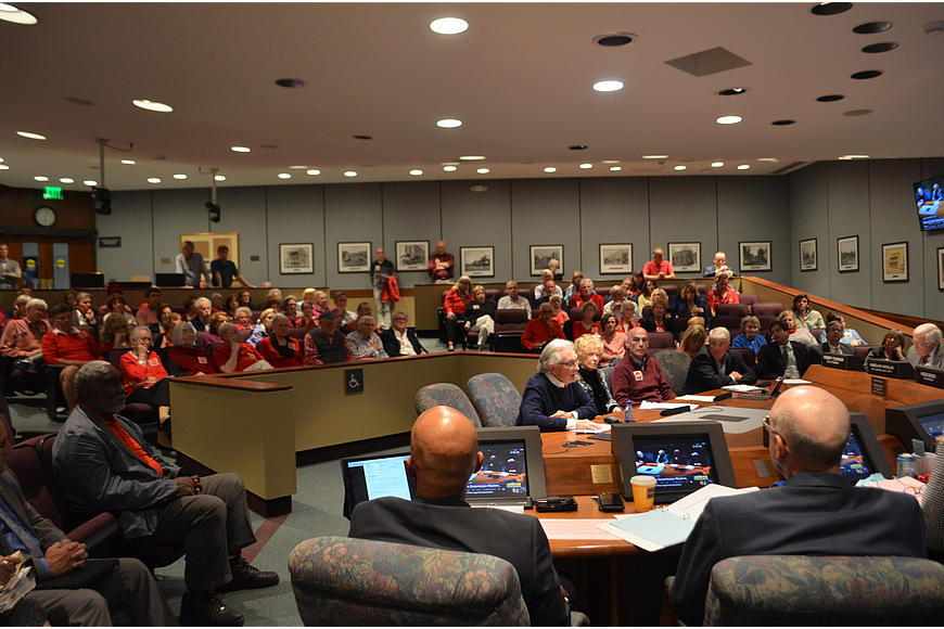 Residents wore red to several City Commission meetings to show their support for STOP&#39;s objectives.