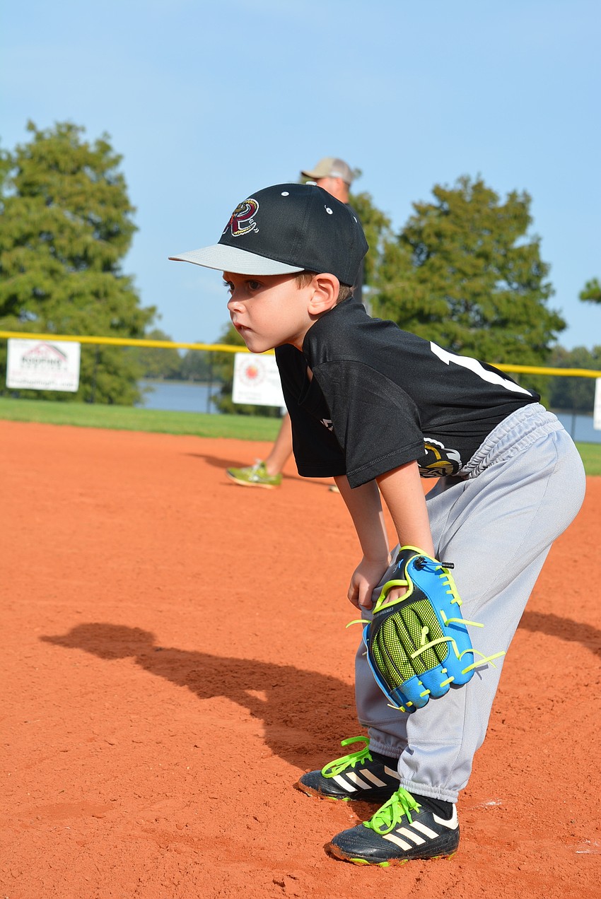 Braden River Elementary School first-grader  Ben Offner plays first base.