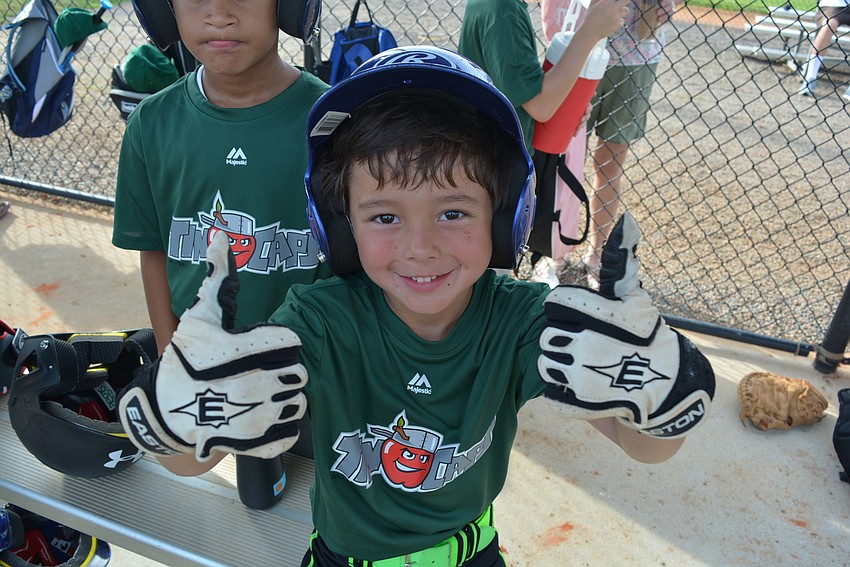 Six-year-old Chase Carter, on the Tin Caps team, said he loved being out on the field again. 