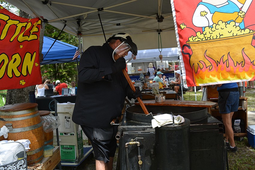 Dave Crays, of Crays Kettle Corn, prepares a fresh batch of popcorn for sale.