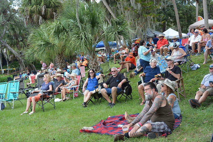Attendees brought lawn chairs and blankets to sit along the banks of the Braden River.