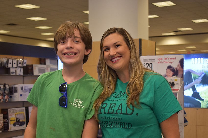 Student Lucian Rominiecki and Jennifer Wise during the book fair.
