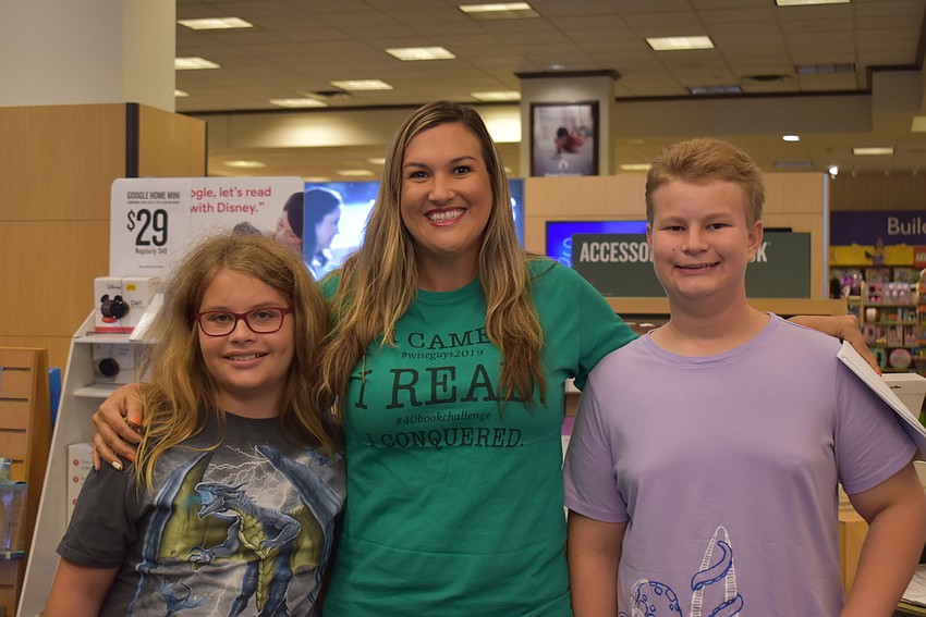 Bohdan Wietrzykowski, Jennifer Wise and Remy Blunier during the book fair.