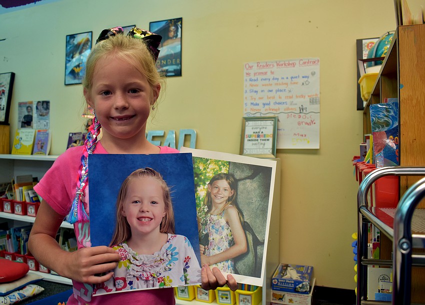 Payton Wingard shows off photos of her and her mom, both taken as students at Fruitville Elementary.