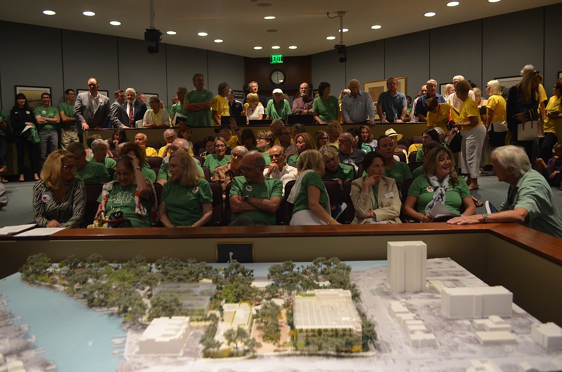 Project supporters wore green and opponents wore yellow to Wednesday&#39;s meeting on the Selby Gardens master plan proposal.