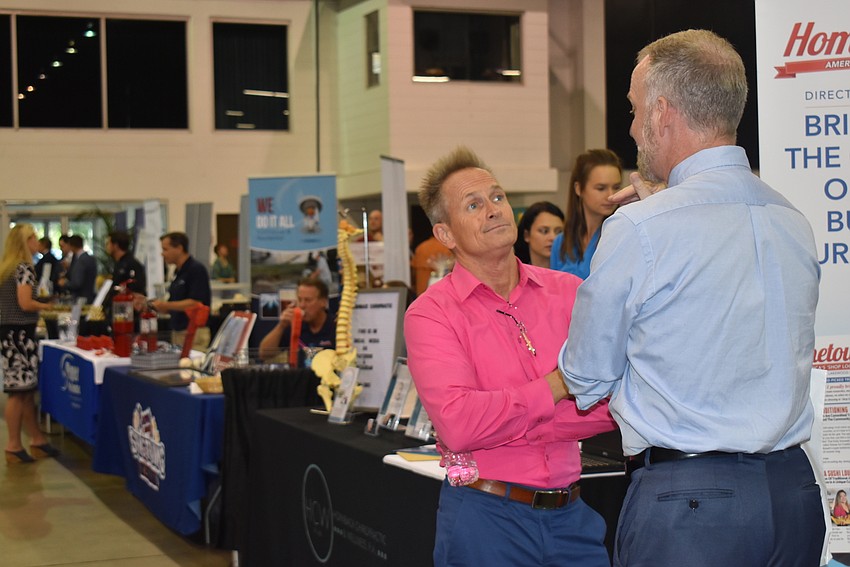 Ken Burke and Jeffery Kin chat at the beginning, before the expo was packed.