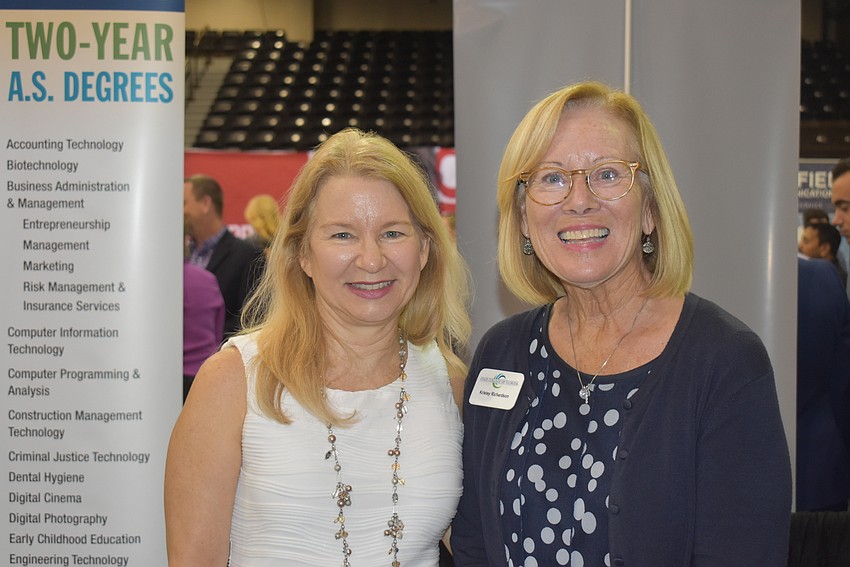 Lee Kotwicki and Kristey Richardson man the State College of Florida booth.
