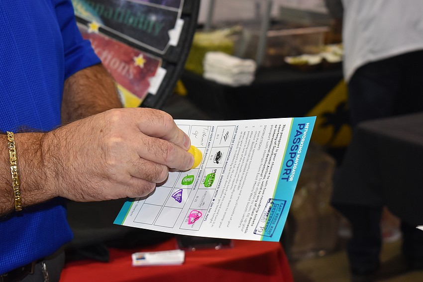 A passport is stamped. If attendees filled them, they could enter a drawing.