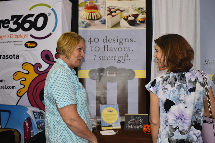 Kelly Erdmann greets Kendra Gemma like an old friend.