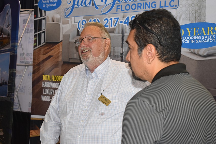 Jack Dean is jovial as he works to showcase his business.