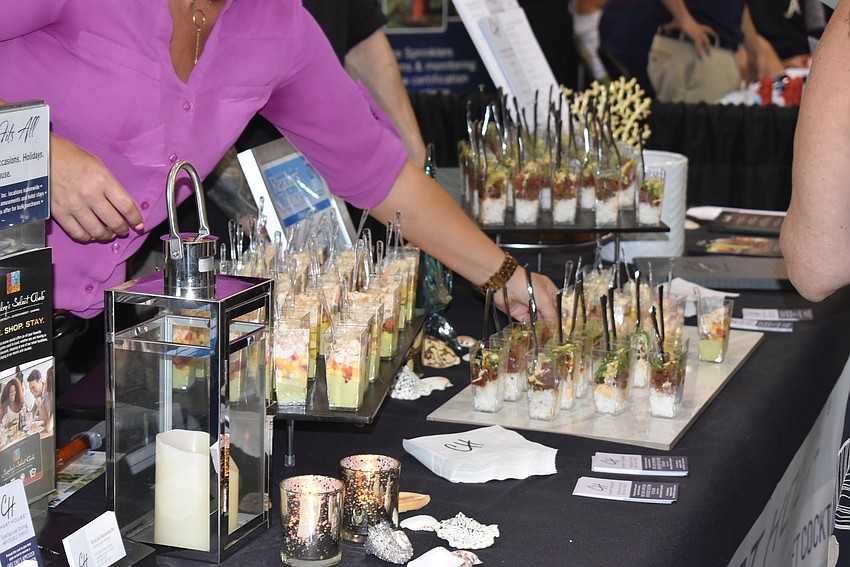 The Chart House table, situated at the front of the expo, was frequently visited.