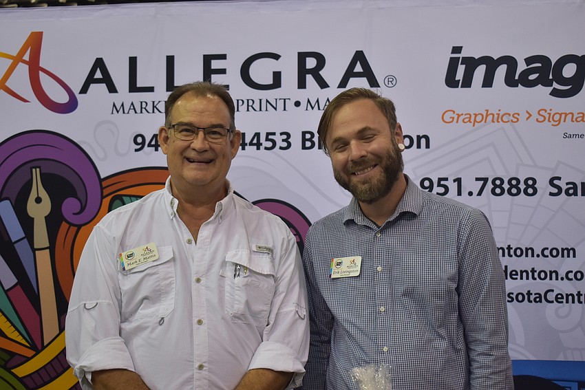 Mark Mattis and Erik Livingston were all smiles for any who came by their table.