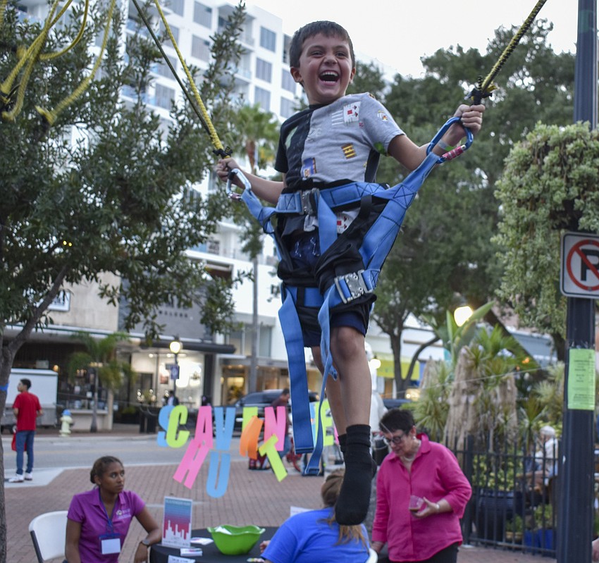Xavier Anselmo, 5, bounces on a trampoline.