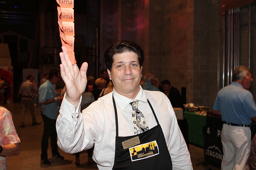 Travis Rogers passed out raffle tickets