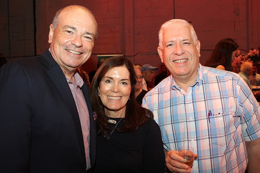Executive Director Richard Russell with Marianne and Lou Cohen