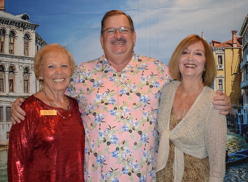 From left, Tara Golf and Country Club's Judy Harris, Phil Parsch and Janet Goldberg enjoy a night of Italian food, trivia and music during the San Gennaro Festival at the club.