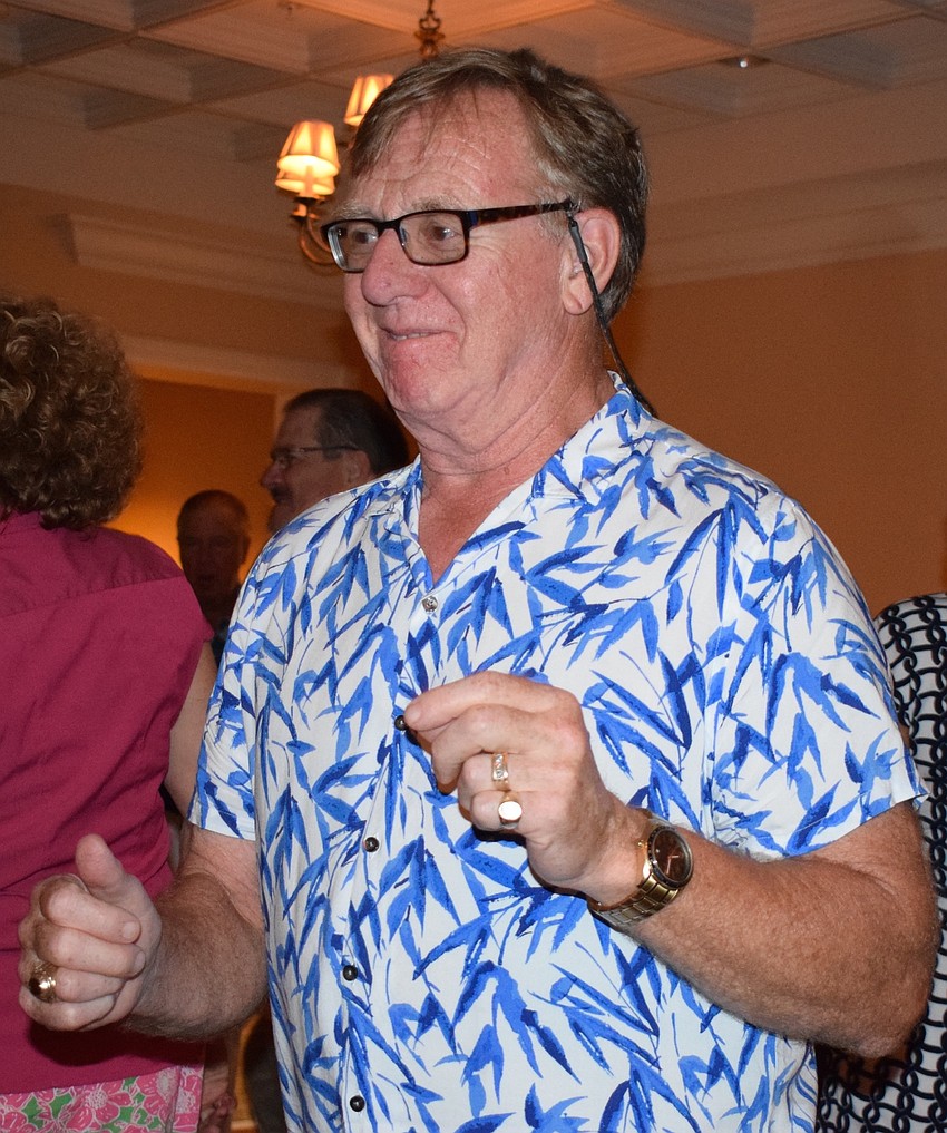 Tara resident Frank Witgen dances during the San Gennaro Festival at Tara Golf and Country Club.