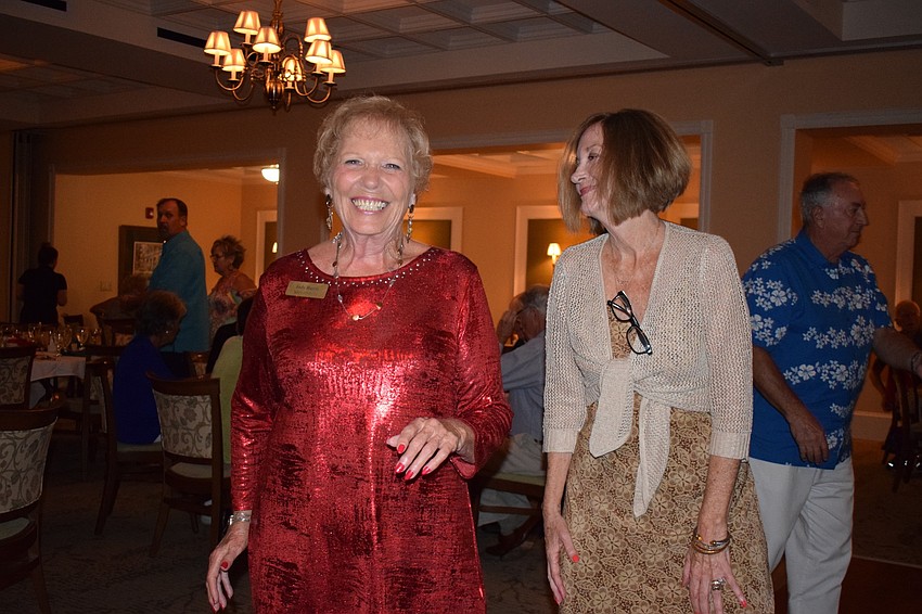 Tara Golf and Country Club's Judy Harris and Janet Goldberg dance together at the San Gennaro Festival.