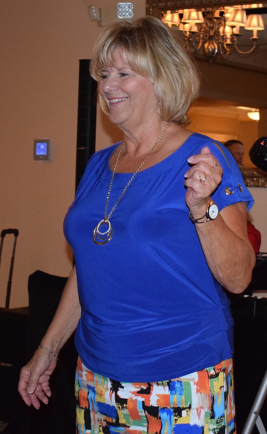 Tara resident Joyce Chaffee dances with friends during the San Gennaro Festival.