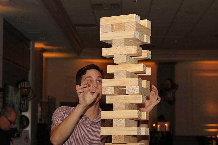 Caden Foos played Jenga.