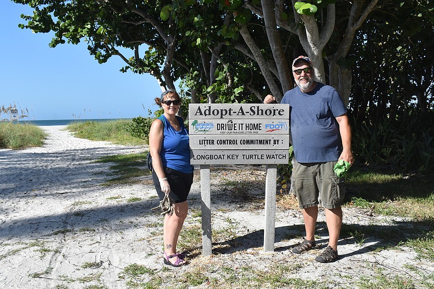 Karey and Charles Kaine keeping Manatee beautiful.