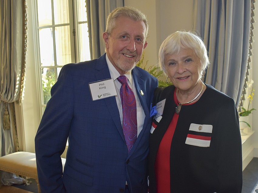 Paul King and Karen Holbrook, regional chancellor of University of South Florida Sarasota-Manatee