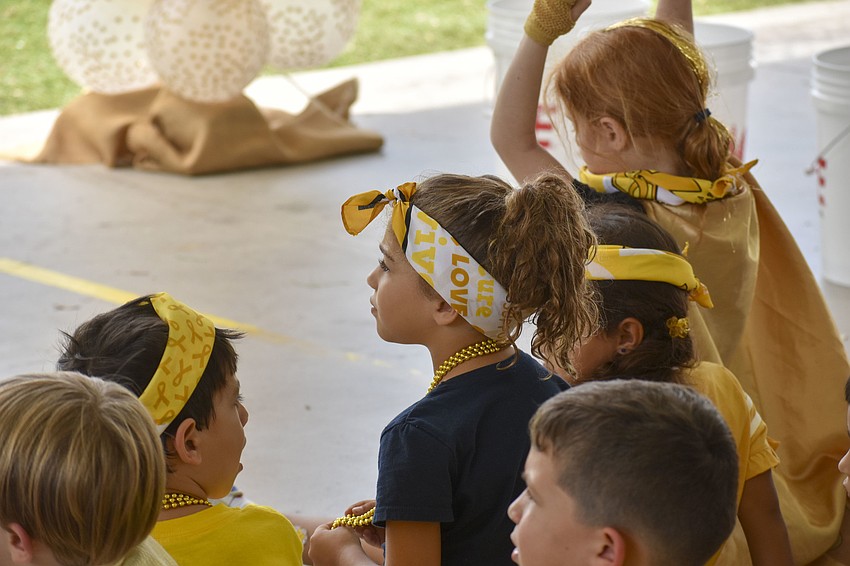 Southside elementary schoolers wore gold to represent love and compassion.
