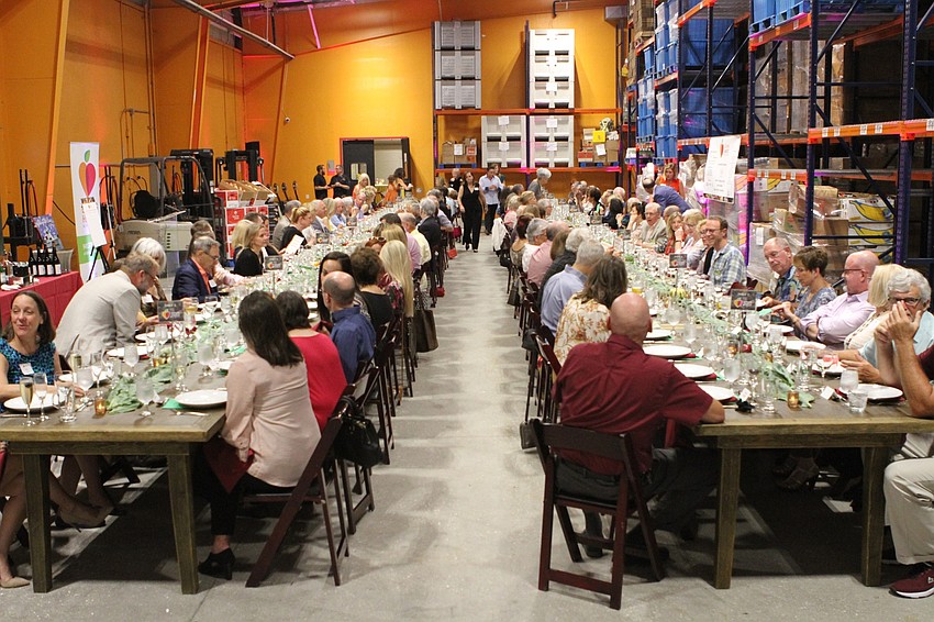 Guests filled into the warehouse to eat following the reception.