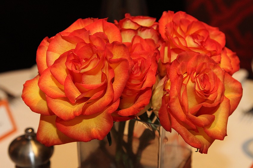Roses adorned each of the tables.
