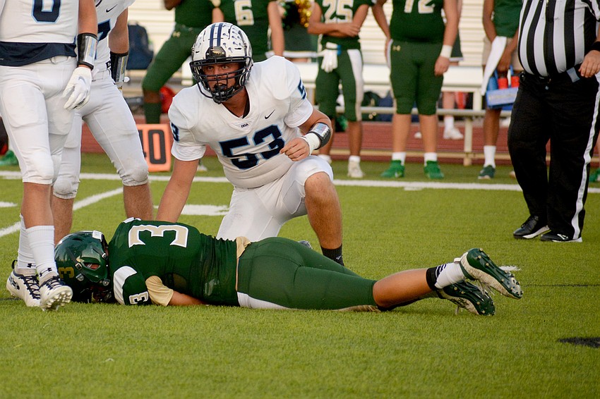 ODA defensive lineman J.J. Easto looks to the sideline after a tackle for loss.