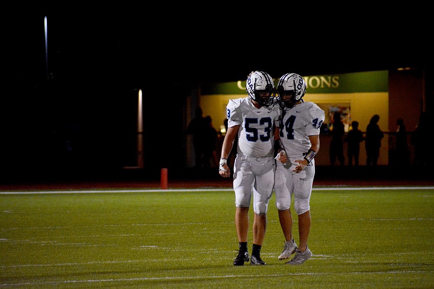 ODA's JJ Easto (53) and Luca Marfella (44) come together after an Easto tackle.