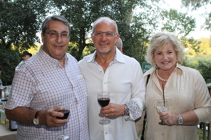 John Simon with Mark and Lana Williams