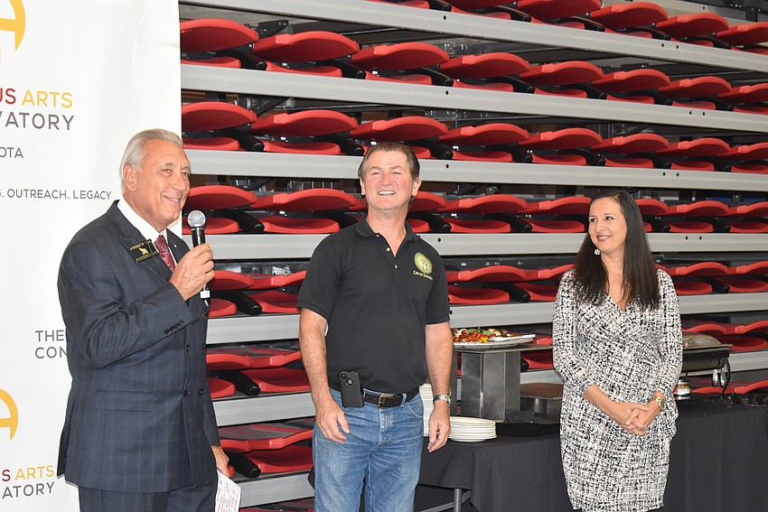 Andrew Vac with Circus Arts Conservatory owner Pedro Reis and managing director Jennifer Mitchell.