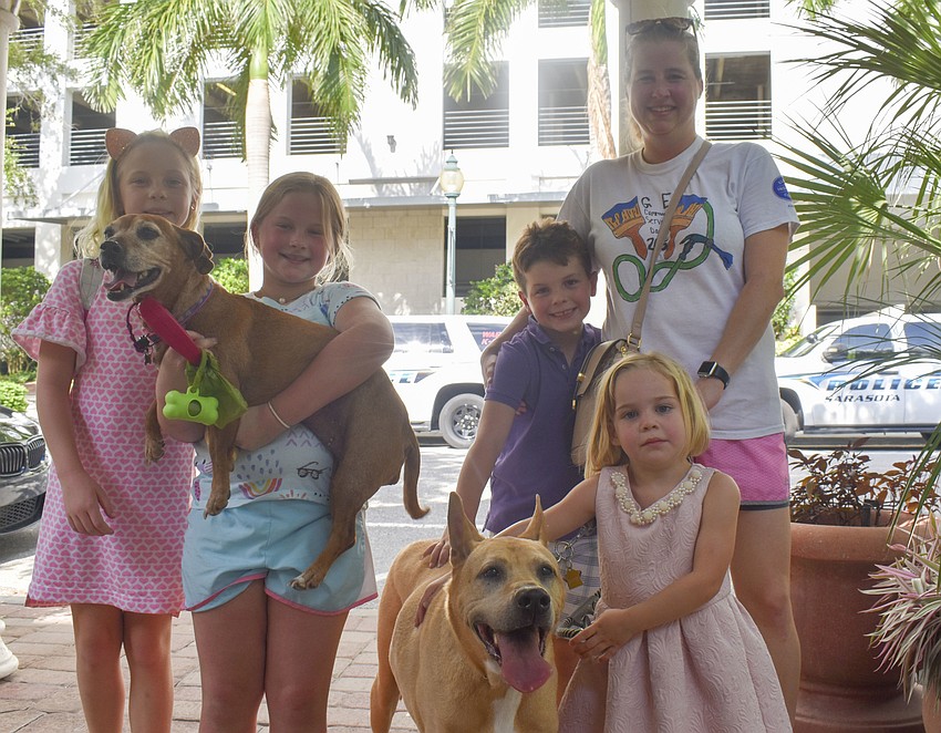 Maggie Wood, Camille Wood and her dog Duper, Michael Wood, Kate Wood, Martha Wood and her dog Eli.
