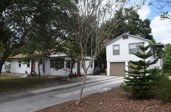 Accessory dwelling units can either be attached to a primary residence or located in a separate structure, such as this unit located above a parking garage in Laurel Park.