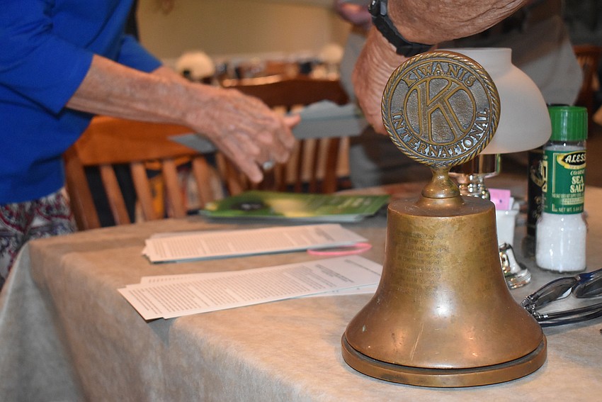 Larson sells tickets for the Kiwanis Lawn Party.