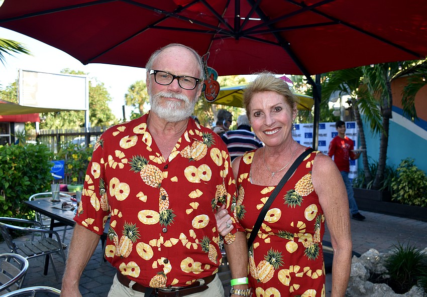 Kraig and Judy Henderson wear outfits they bought on their honeymoon 25 years ago.