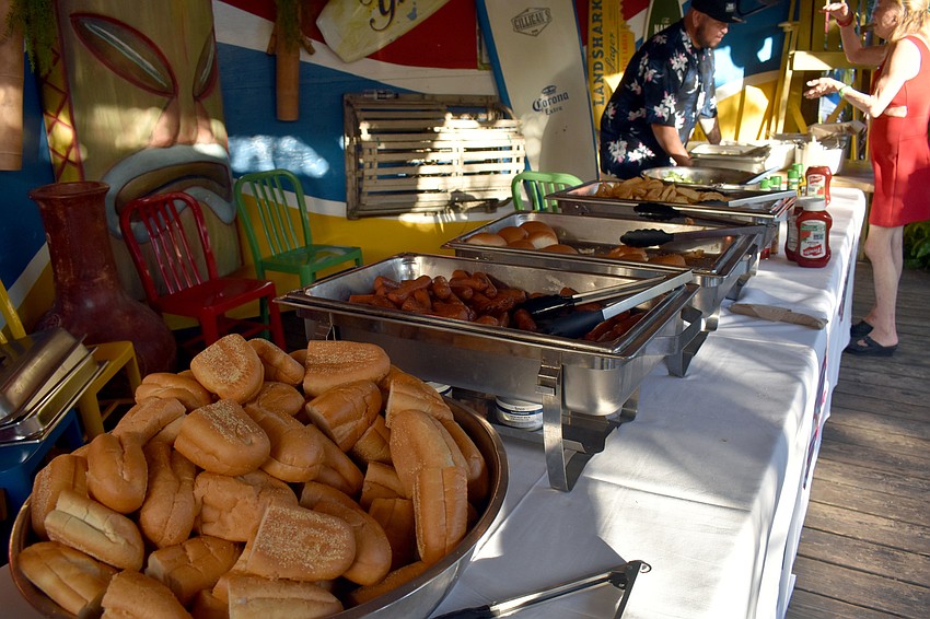 Guests feasted on barbecue food and danced to '60s music.