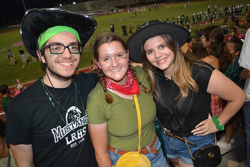 Seniors Chris Georgas, Morgan Deglopper and Kara Smith were sad because it was their last homecoming game.