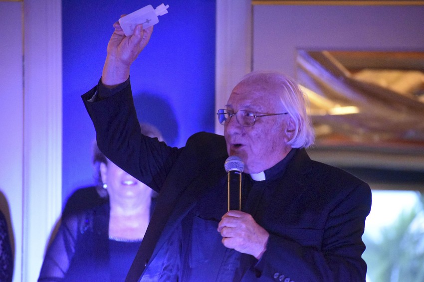 Father Fausto Stampiglia blesses the animals.