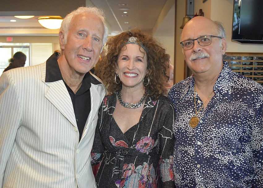 James Rollo poses with Judithann and Robert Zack.