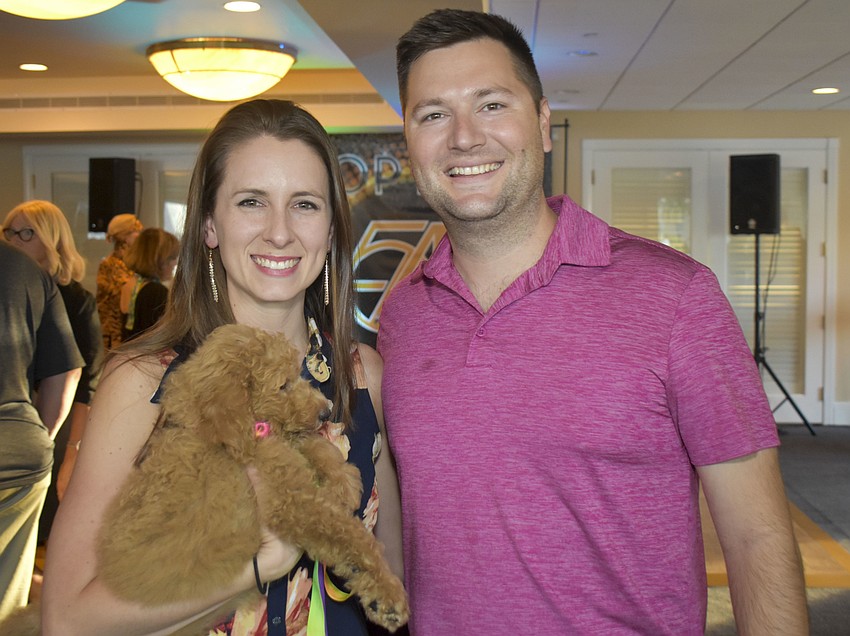 Casey Siljestorm and Nick Altier with 9-week-old Lilo.