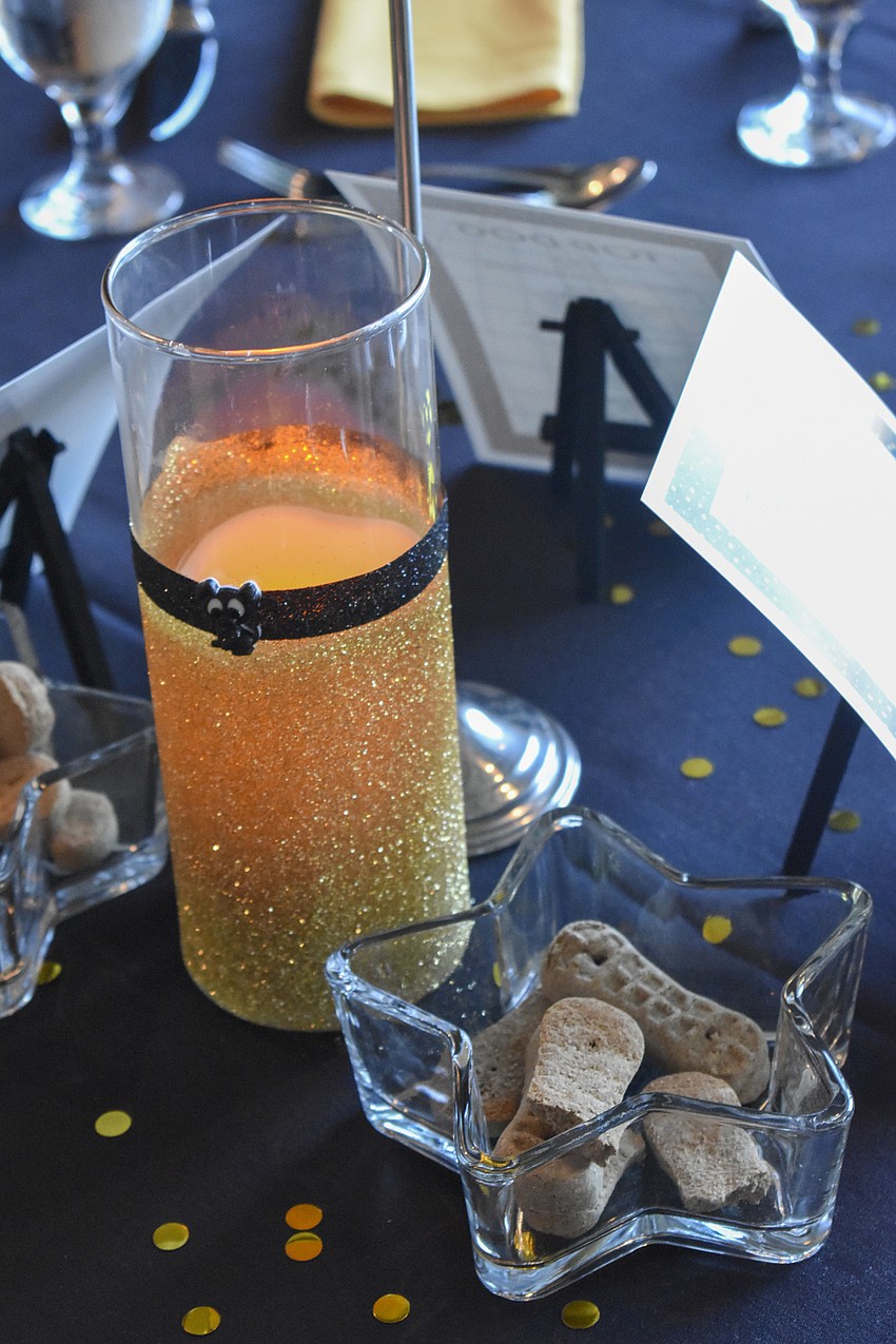 Each table is ready with dog treats.