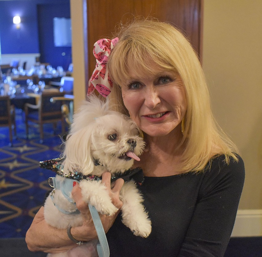 Dabbie Maltese with her maltese Kip.