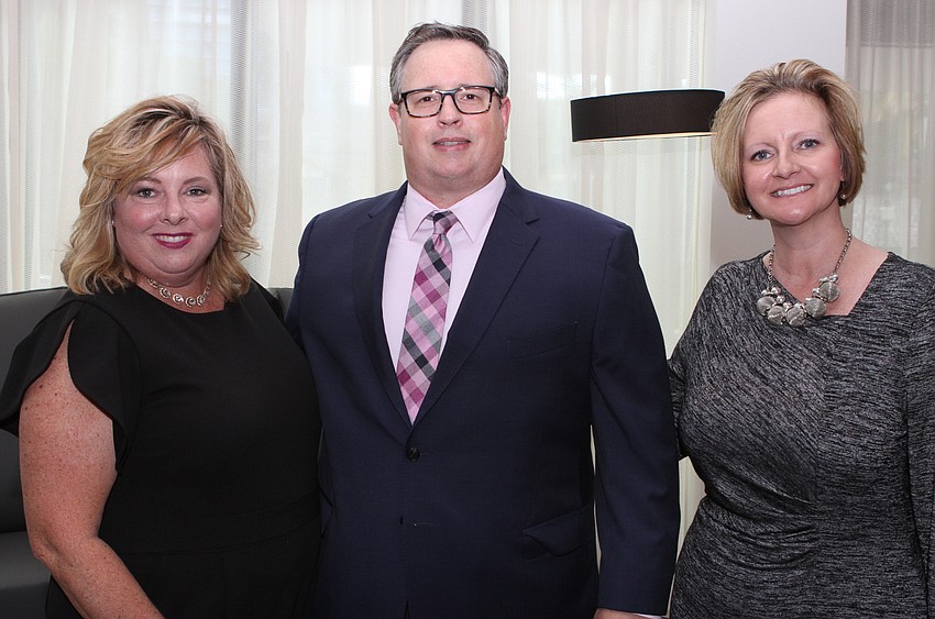 Marlo and Jay Turner with Robin Faucy-Washington